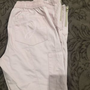 Small scrub pants, Jaanuu. Blush, gold zip ankle.